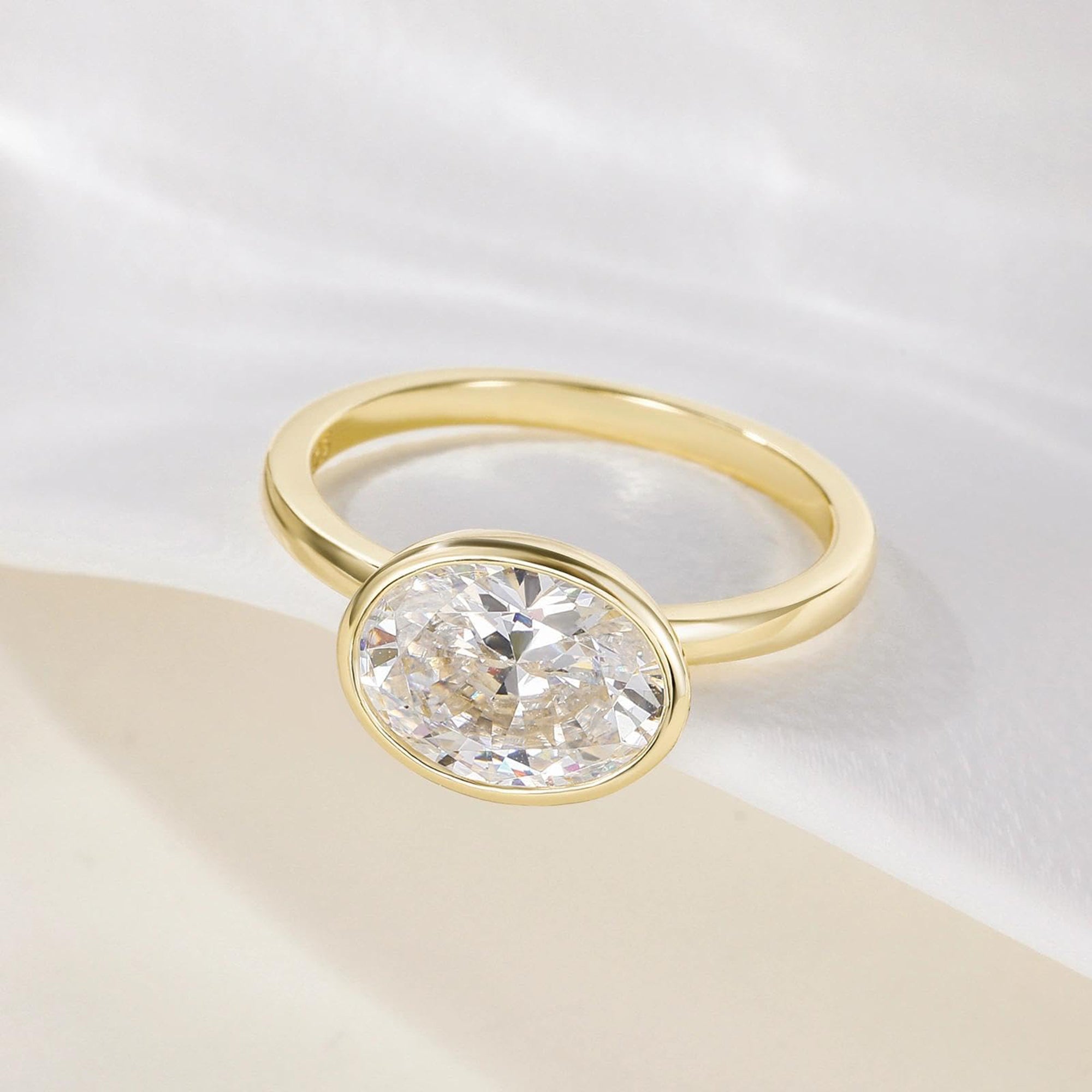 3CT Oval Cut East West Bezel Solitaire Engagement Ring